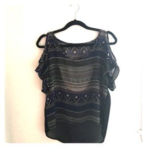 Loose fitting sheer patterned top. Size S.